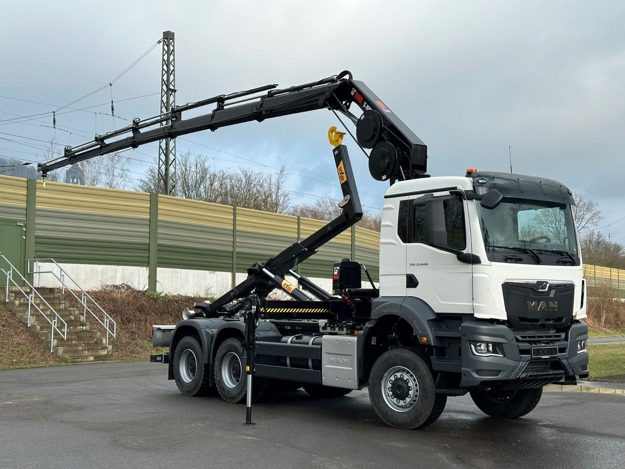 MAN TGS 33.440 6x6 BB Abrollkipper+Kran Hiab 228-6 - Haakarmsysteem vrachtwagen, Kraanwagen: afbeelding 3 MAN TGS 33.440 6x6 BB Abrollkipper+Kran Hiab 228-6 - Haakarmsysteem vrachtwagen, Kraanwagen: afbeelding 3