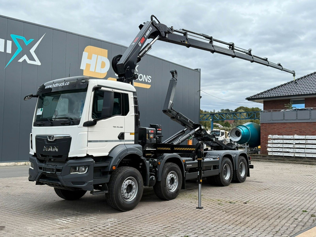 MAN TGS 35.480 8x4 Abrollkipper + Kran HIAB 228-6 - Haakarmsysteem vrachtwagen, Kraanwagen: afbeelding 1 MAN TGS 35.480 8x4 Abrollkipper + Kran HIAB 228-6 - Haakarmsysteem vrachtwagen, Kraanwagen: afbeelding 1