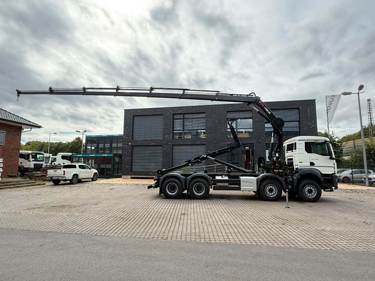 MAN TGS 35.480 8x4 Abrollkipper + Kran HIAB 228-6 - Haakarmsysteem vrachtwagen, Kraanwagen: afbeelding 3 MAN TGS 35.480 8x4 Abrollkipper + Kran HIAB 228-6 - Haakarmsysteem vrachtwagen, Kraanwagen: afbeelding 3