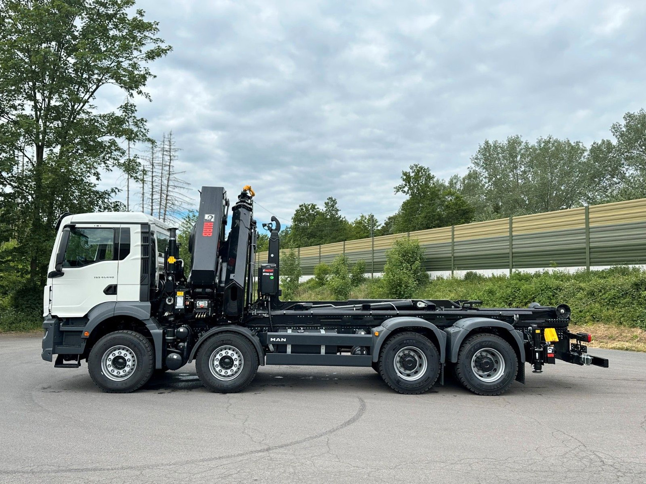 MAN TGS 35.520 8x4 Abrollkipper + Kran HIAB 658E6 - Haakarmsysteem vrachtwagen, Kraanwagen: afbeelding 4 MAN TGS 35.520 8x4 Abrollkipper + Kran HIAB 658E6 - Haakarmsysteem vrachtwagen, Kraanwagen: afbeelding 4