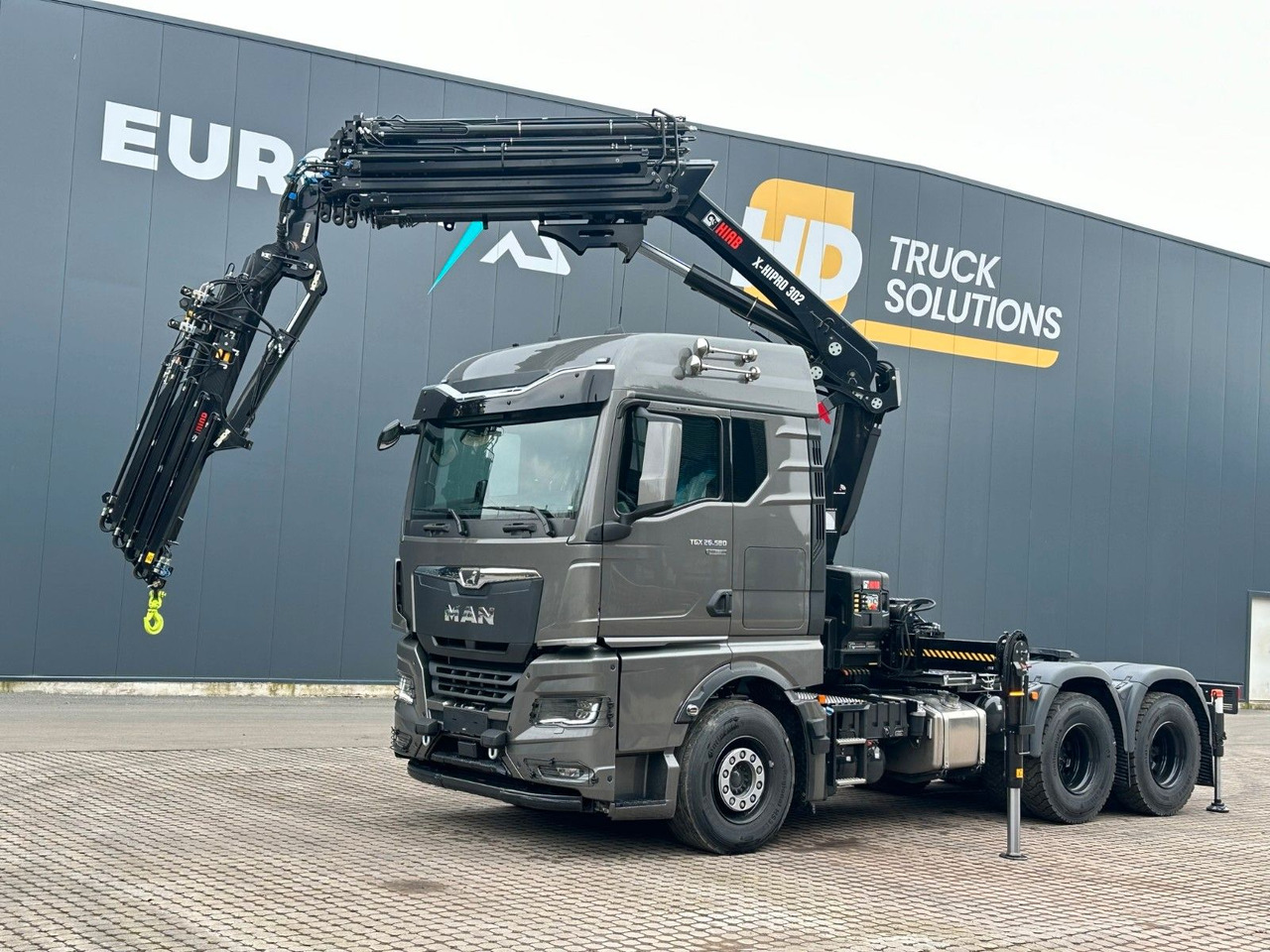 MAN TGX 26.580 6x4 Kran Hiab 302-6 + Jib-4 - Kraanwagen: afbeelding 1 MAN TGX 26.580 6x4 Kran Hiab 302-6 + Jib-4 - Kraanwagen: afbeelding 1