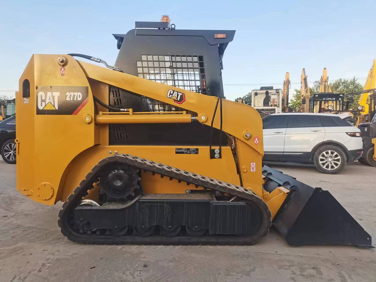 - Compacte rupslader: afbeelding 5 - Compacte rupslader: afbeelding 5