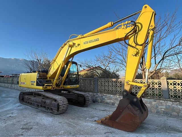 New Holland E245B - Graafmachine: afbeelding 1 New Holland E245B - Graafmachine: afbeelding 1