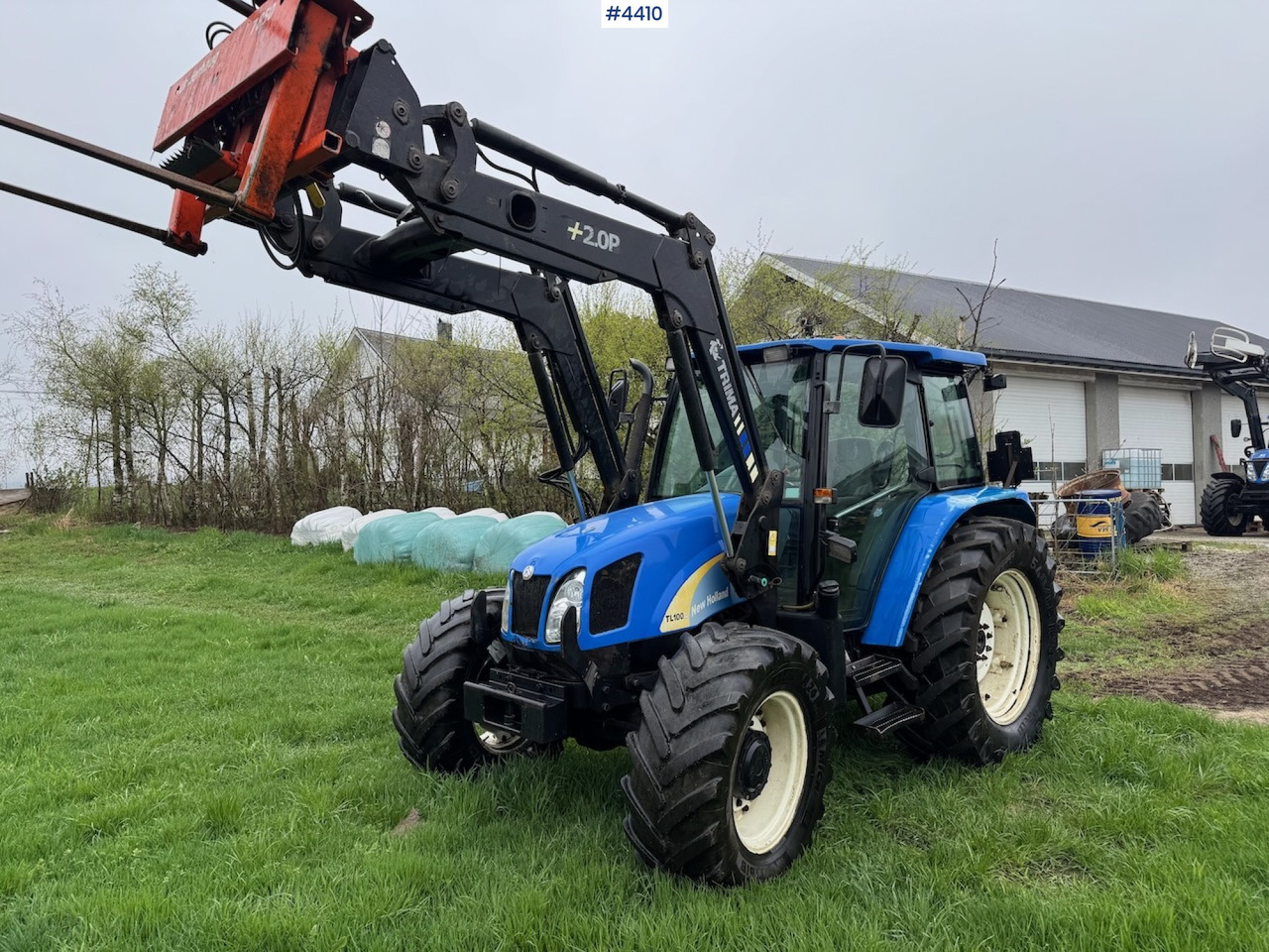 2006 New Holland TL100 A w/Front Loader. - Tractor: afbeelding 1 2006 New Holland TL100 A w/Front Loader. - Tractor: afbeelding 1