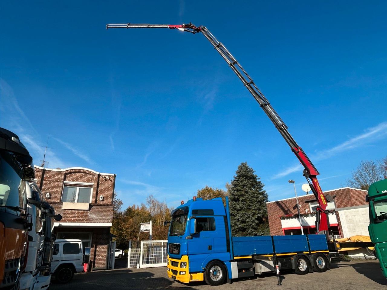 MAN 26.440 TGX Pritsche + PK 34002 + JIB Seilwinde - Kraanwagen: afbeelding 1 MAN 26.440 TGX Pritsche + PK 34002 + JIB Seilwinde - Kraanwagen: afbeelding 1