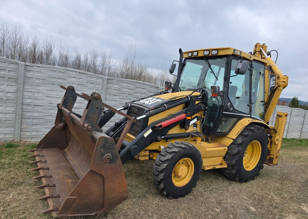 Caterpillar - Graaflaadmachine: afbeelding 1 Caterpillar - Graaflaadmachine: afbeelding 1