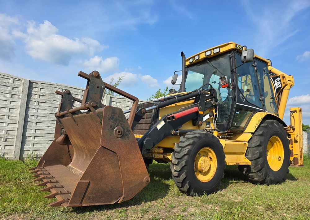 Caterpillar - Graaflaadmachine: afbeelding 1 Caterpillar - Graaflaadmachine: afbeelding 1