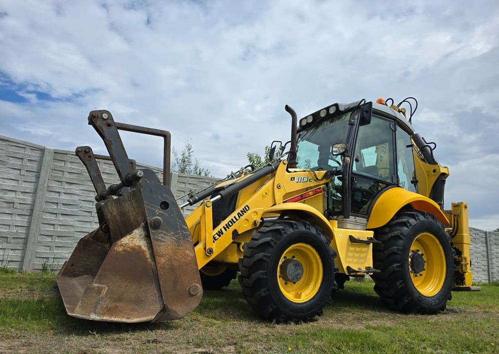 New Holland - Graaflaadmachine: afbeelding 1 New Holland - Graaflaadmachine: afbeelding 1