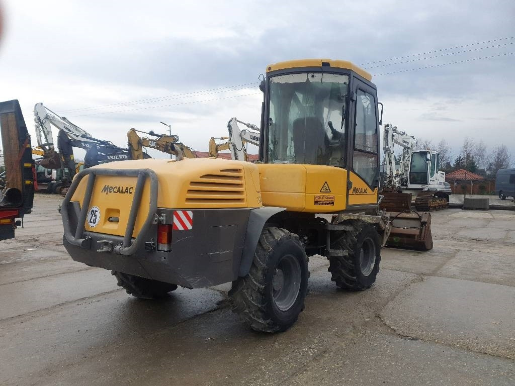 Mecalac 12 M TX - Mobiele graafmachine: afbeelding 4 Mecalac 12 M TX - Mobiele graafmachine: afbeelding 4