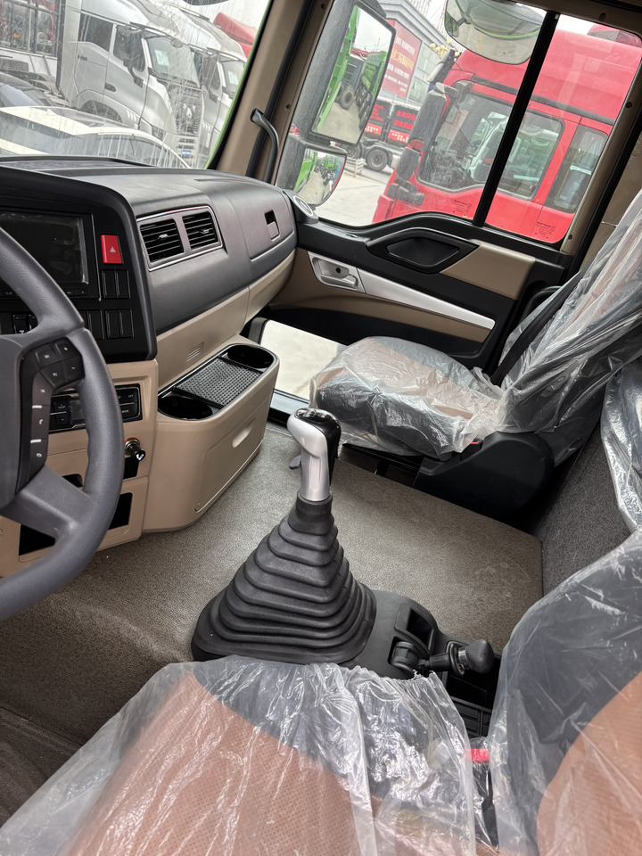 SINOTRUCK HOWO - Kipper vrachtwagen: afbeelding 4 SINOTRUCK HOWO - Kipper vrachtwagen: afbeelding 4