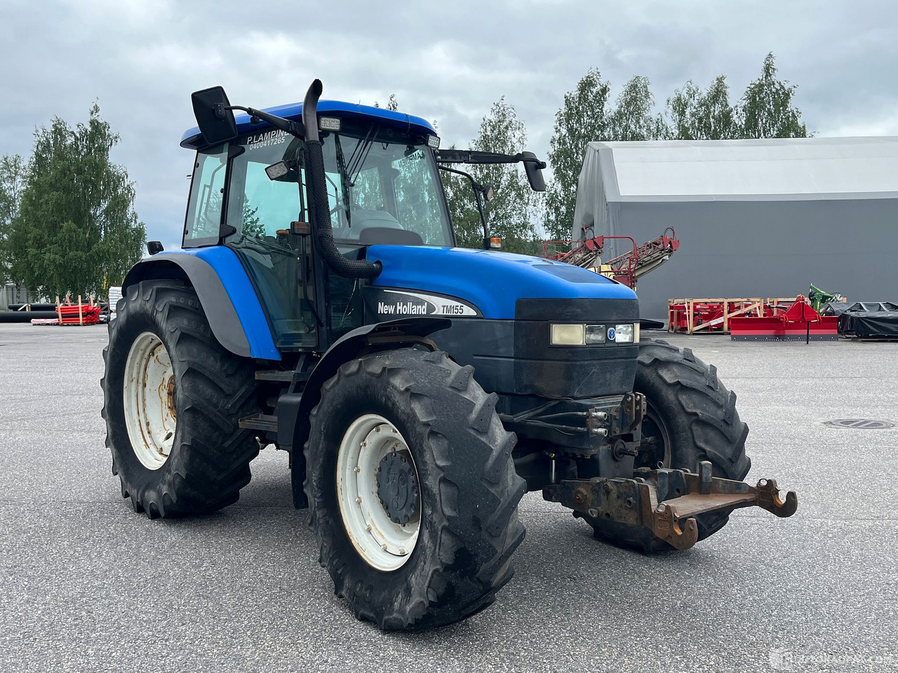 New Holland TM155, traktori etunostolaitteeella, 2004,, Salo - Landbouwmachine: afbeelding 4 New Holland TM155, traktori etunostolaitteeella, 2004,, Salo - Landbouwmachine: afbeelding 4