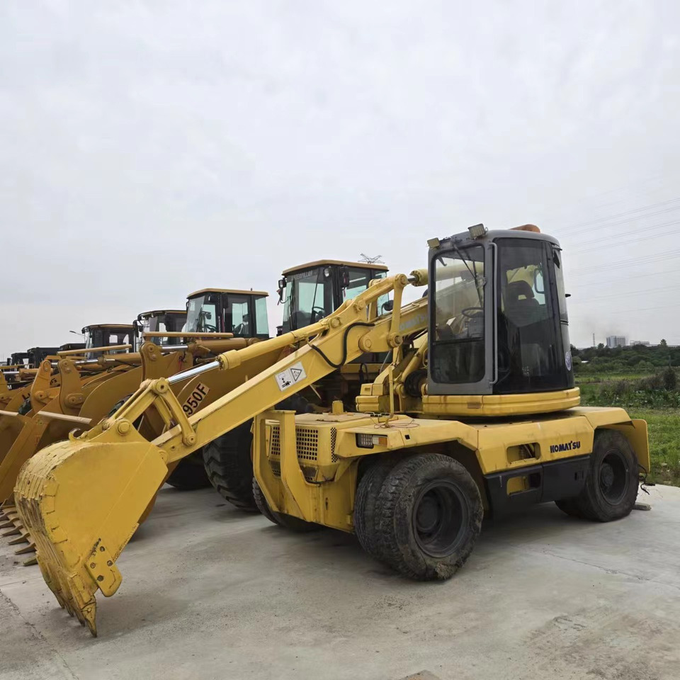 KOMATSU PC128US - Mobiele graafmachine: afbeelding 1 KOMATSU PC128US - Mobiele graafmachine: afbeelding 1