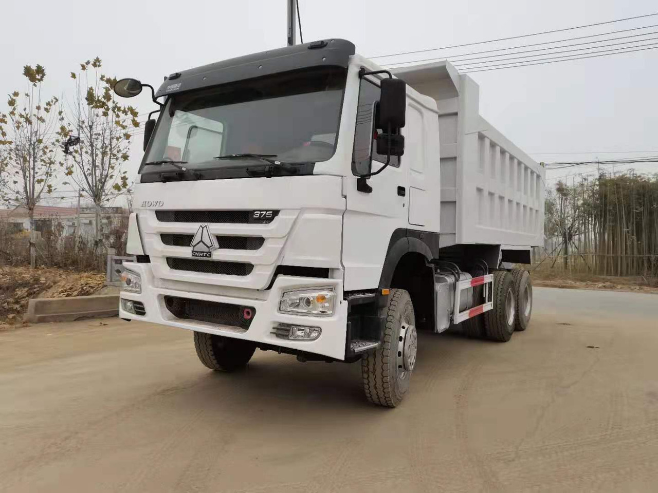 SINOTRUK HOWO - Kipper vrachtwagen: afbeelding 4 SINOTRUK HOWO - Kipper vrachtwagen: afbeelding 4