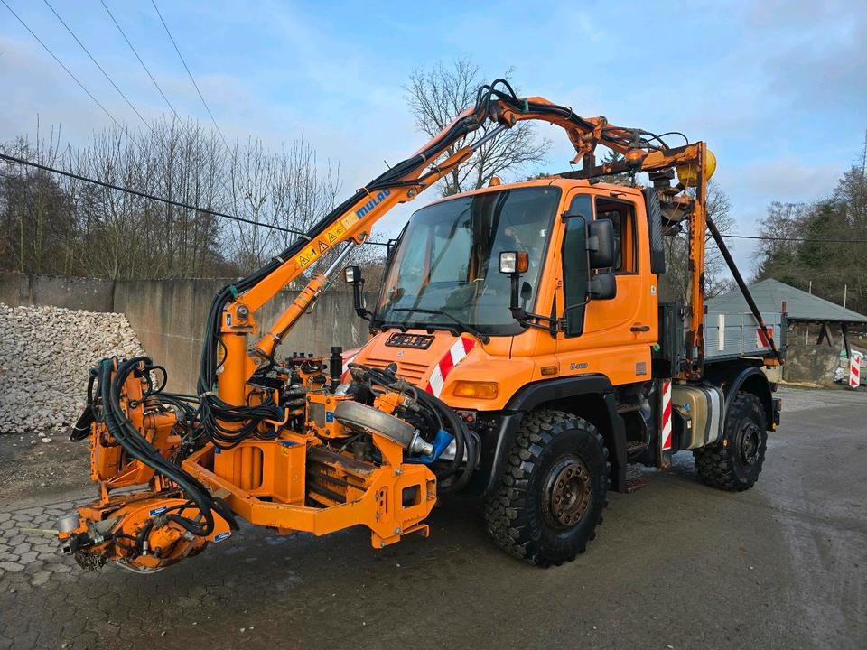 Unimog U400 2013 405/10 405/12 NKS-Z-UGN-43K Bluetec 5 Mercedes-Benz UGE UGN Mulag MKM700 Mähausleger Böschungsmäher Böschungsmulcher Küpper-Weisser IMS Salzstreuer - Gemeentelijke machine/ Speciaal: afbeelding 1 Unimog U400 2013 405/10 405/12 NKS-Z-UGN-43K Bluetec 5 Mercedes-Benz UGE UGN Mulag MKM700 Mähausleger Böschungsmäher Böschungsmulcher Küpper-Weisser IMS Salzstreuer - Gemeentelijke machine/ Speciaal: afbeelding 1