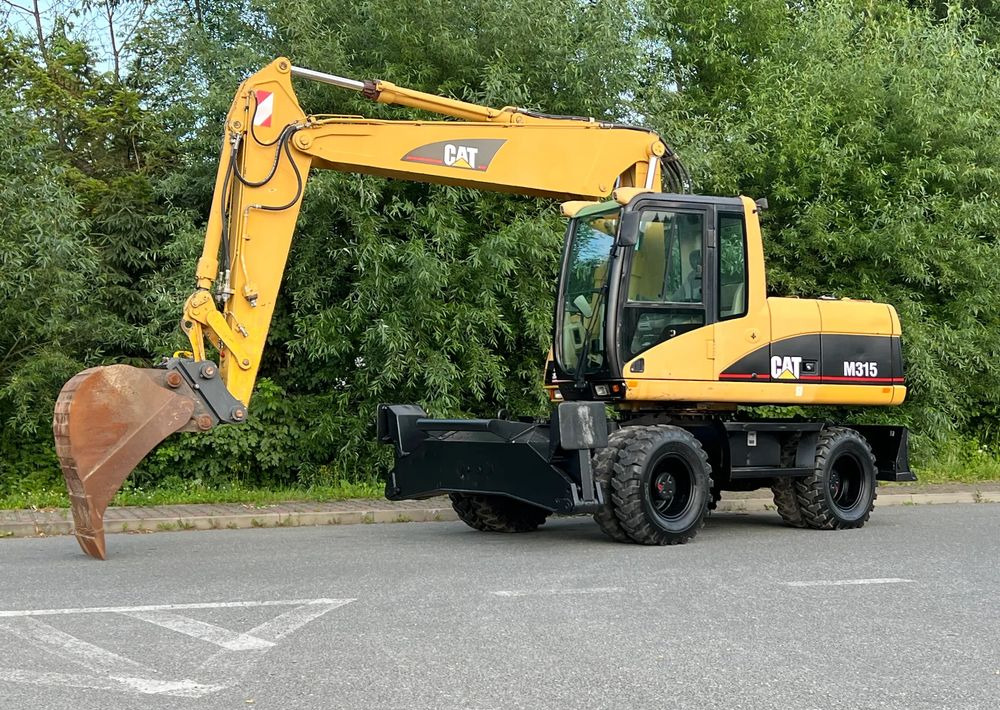 Caterpillar CAT M315C CATERPILLAR SPROWADZONY Bardzo Dobry Stan - Mobiele graafmachine: afbeelding 1 Caterpillar CAT M315C CATERPILLAR SPROWADZONY Bardzo Dobry Stan - Mobiele graafmachine: afbeelding 1