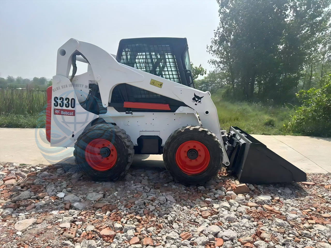 BOBCAT 330 - Schranklader: afbeelding 1 BOBCAT 330 - Schranklader: afbeelding 1