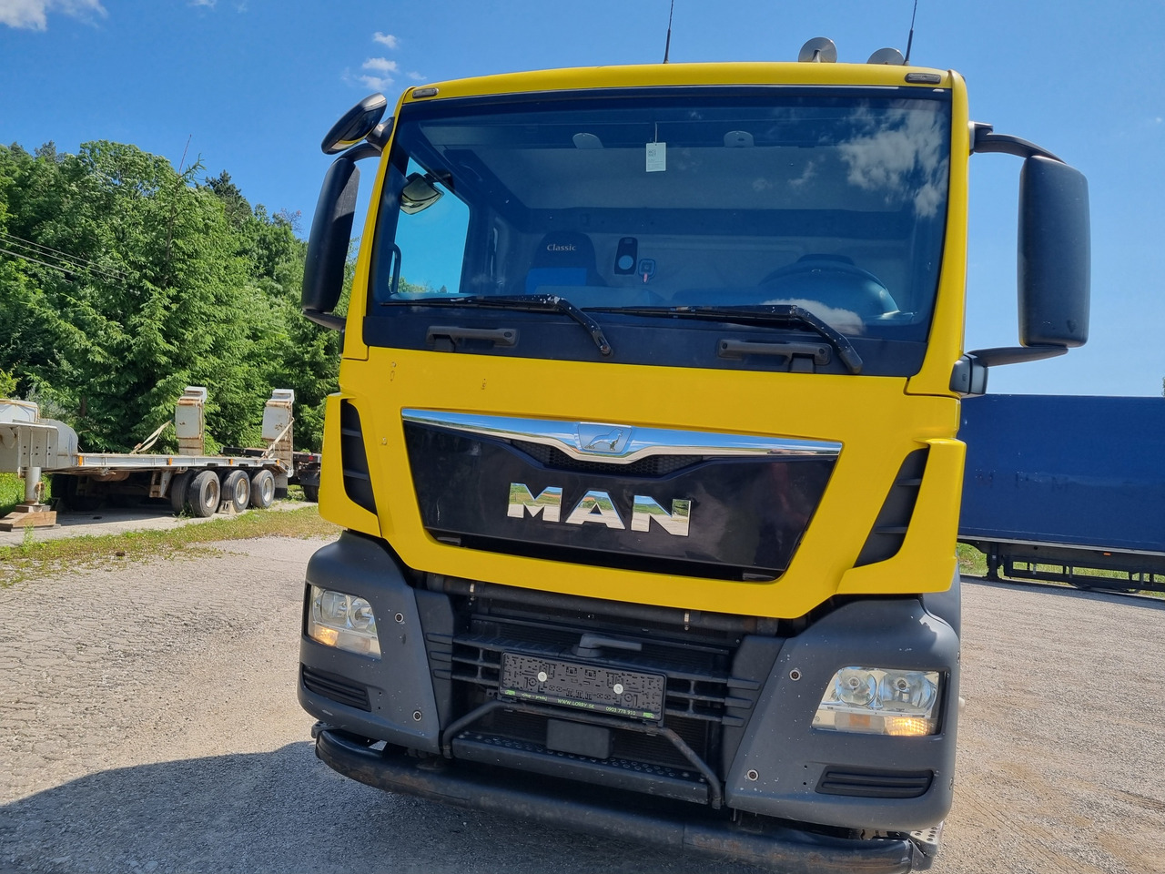 MAN TGS 33.480 6x4 ABROLLKIPPER HIAB Multilift 18 T - Haakarmsysteem vrachtwagen: afbeelding 2 MAN TGS 33.480 6x4 ABROLLKIPPER HIAB Multilift 18 T - Haakarmsysteem vrachtwagen: afbeelding 2