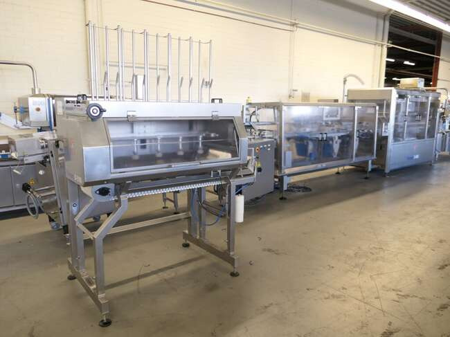 Tramper filling- and traysealing line GMD99-2 - Verpakkingsmachine: afbeelding 1 Tramper filling- and traysealing line GMD99-2 - Verpakkingsmachine: afbeelding 1
