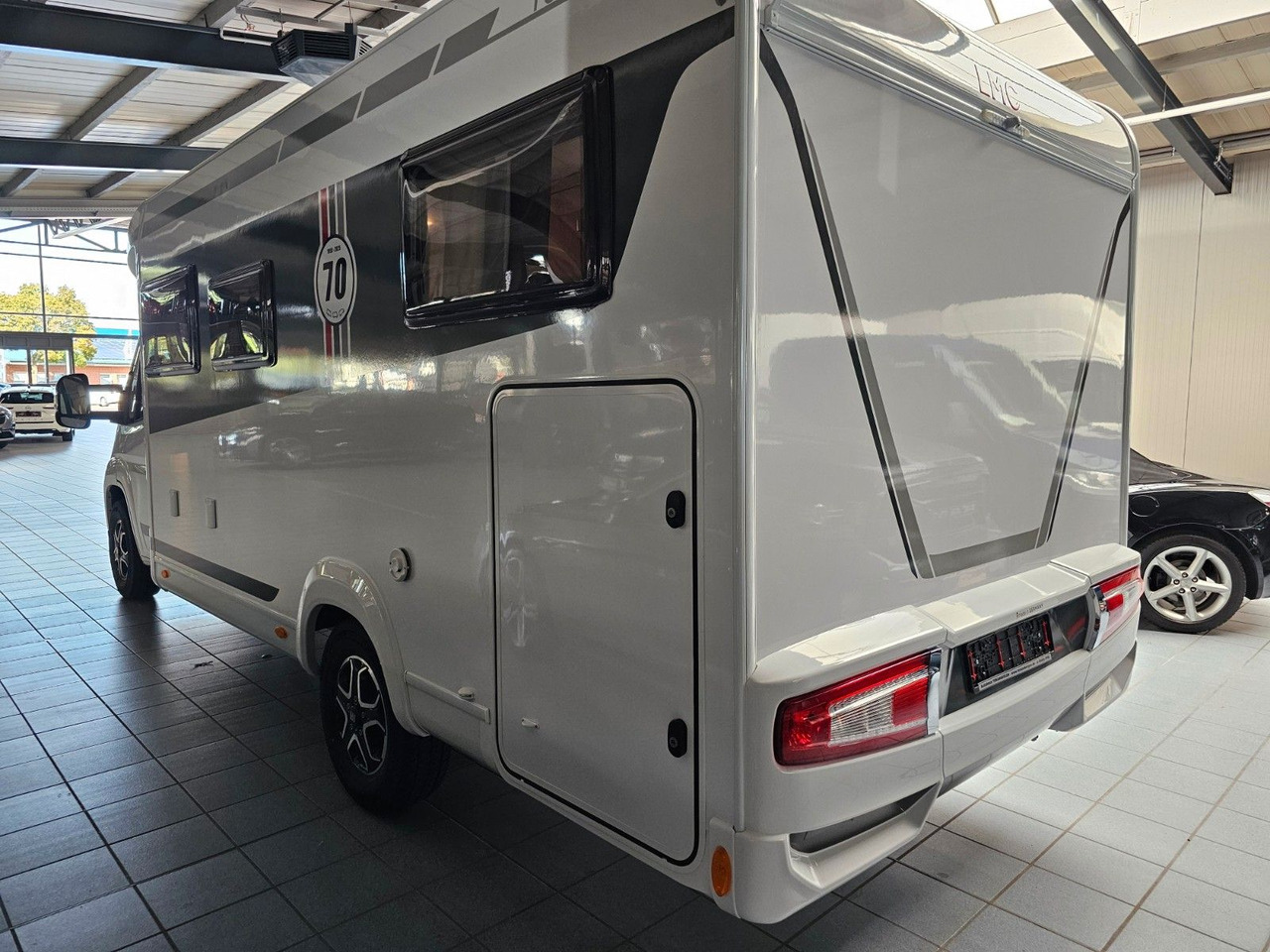 LMC Tourer T660G 70 Jahre AT-8 WC Markise Navi - Half integraal camper: afbeelding 4 LMC Tourer T660G 70 Jahre AT-8 WC Markise Navi - Half integraal camper: afbeelding 4
