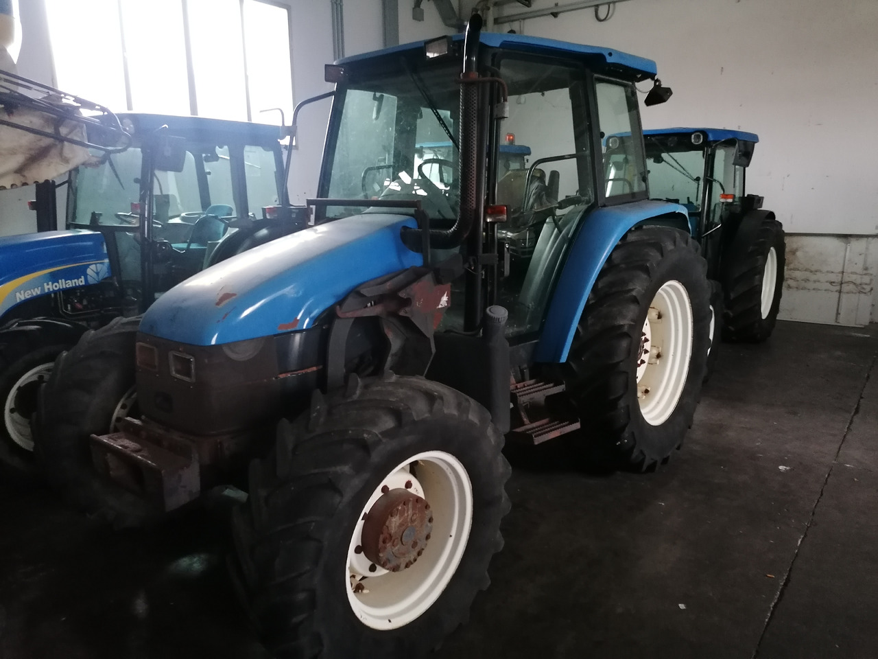NEW HOLLAND TL 90 - Tractor: afbeelding 2 NEW HOLLAND TL 90 - Tractor: afbeelding 2