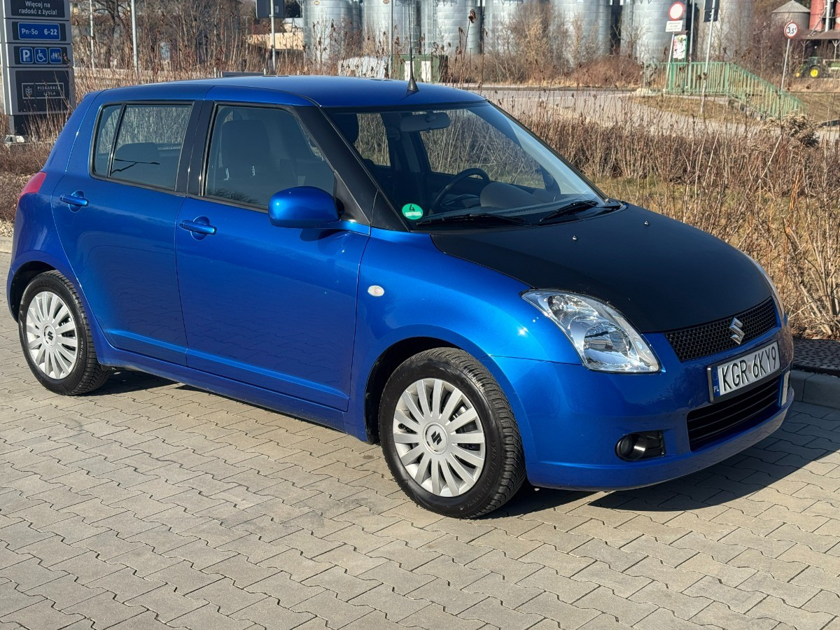 Suzuki Swift 1.3 benzyna 90km Klimatyzacja 136tys przebieg Auto prywatne zadbane - Personenwagen: afbeelding 1 Suzuki Swift 1.3 benzyna 90km Klimatyzacja 136tys przebieg Auto prywatne zadbane - Personenwagen: afbeelding 1
