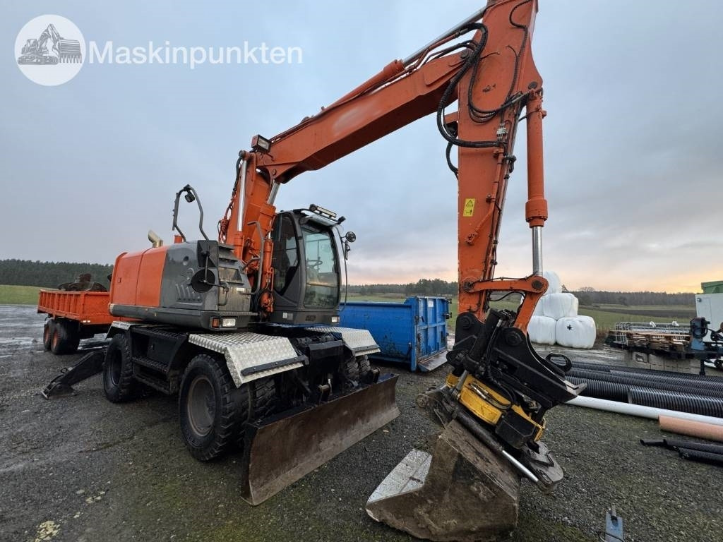 Hitachi ZX 140 W-3 Med vagn och redskap! - Mobiele graafmachine: afbeelding 4 Hitachi ZX 140 W-3 Med vagn och redskap! - Mobiele graafmachine: afbeelding 4