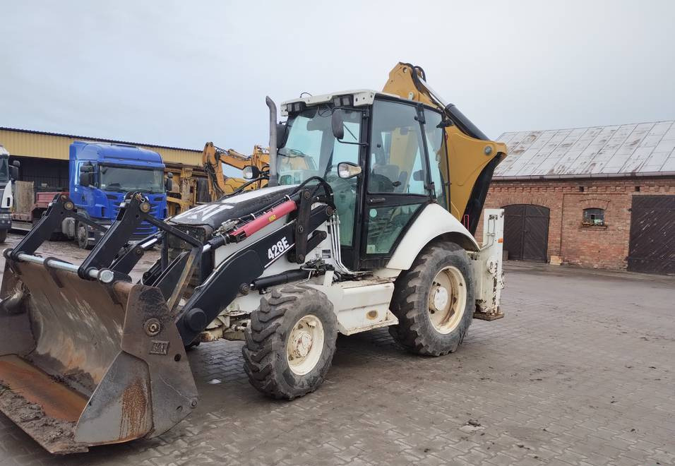 CAT Caterpillar 428E - Graaflaadmachine: afbeelding 1 CAT Caterpillar 428E - Graaflaadmachine: afbeelding 1