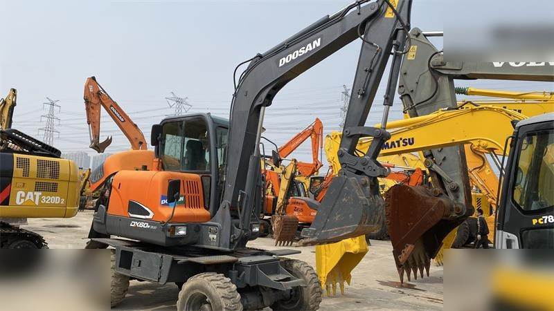 DOOSAN DX60W ECO - Mobiele graafmachine: afbeelding 3 DOOSAN DX60W ECO - Mobiele graafmachine: afbeelding 3
