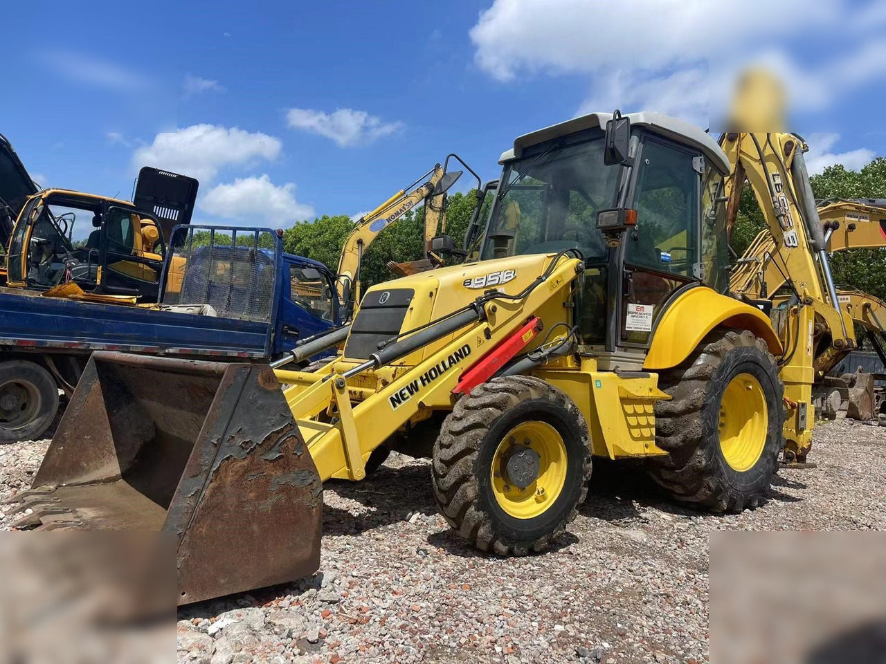 NEW HOLLAND B95B - Graaflaadmachine: afbeelding 1 NEW HOLLAND B95B - Graaflaadmachine: afbeelding 1