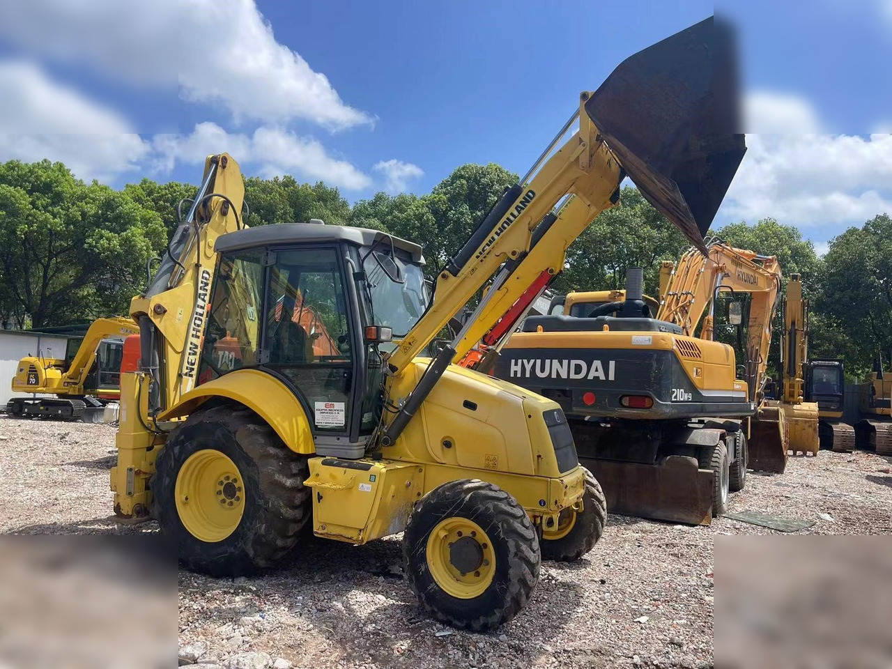 NEW HOLLAND B95B - Graaflaadmachine: afbeelding 4 NEW HOLLAND B95B - Graaflaadmachine: afbeelding 4