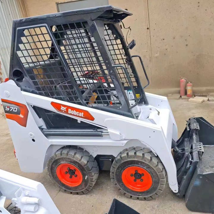 Second Hand Bobcat S70 Skid Steer Loader on Stock Excellent Performance Bobcat S70 S160 S300 330 Skid Steer for Sale - Schranklader: afbeelding 1 Second Hand Bobcat S70 Skid Steer Loader on Stock Excellent Performance Bobcat S70 S160 S300 330 Skid Steer for Sale - Schranklader: afbeelding 1