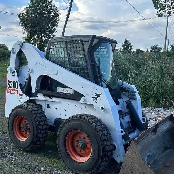 Used Bob Cat Bob Cat S300 Used Mini Skid Steer Wheel Loader Multifunctional Track Loaders Bobcat S300 - Schranklader: afbeelding 1 Used Bob Cat Bob Cat S300 Used Mini Skid Steer Wheel Loader Multifunctional Track Loaders Bobcat S300 - Schranklader: afbeelding 1