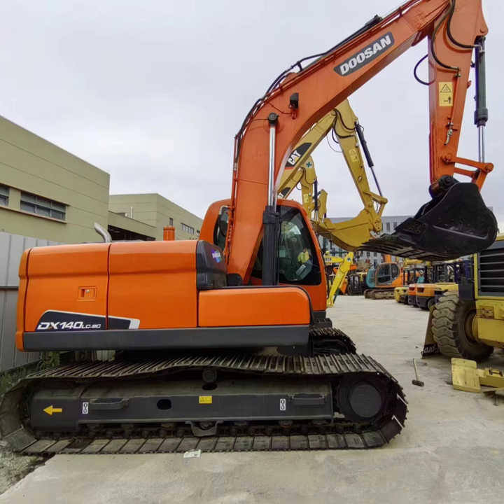 Used Digger DOOSAN DX140 Construction Machinery Construction Digger Used DOOSAN DX140 Cheap Excavator - Rupsgraafmachine: afbeelding 1 Used Digger DOOSAN DX140 Construction Machinery Construction Digger Used DOOSAN DX140 Cheap Excavator - Rupsgraafmachine: afbeelding 1