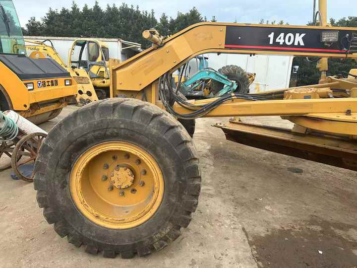 Used Caterpillar CAT 140k Land Road Motor Grader CAT140k Used Grader Cheap Price for Sale - Grader: afbeelding 4 Used Caterpillar CAT 140k Land Road Motor Grader CAT140k Used Grader Cheap Price for Sale - Grader: afbeelding 4