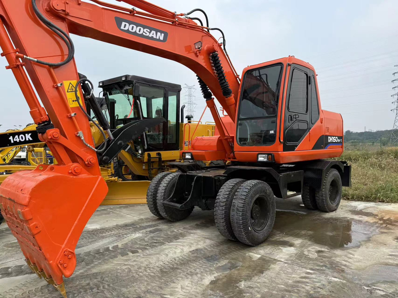DOOSAN DH150W-7 - Mobiele graafmachine: afbeelding 1 DOOSAN DH150W-7 - Mobiele graafmachine: afbeelding 1