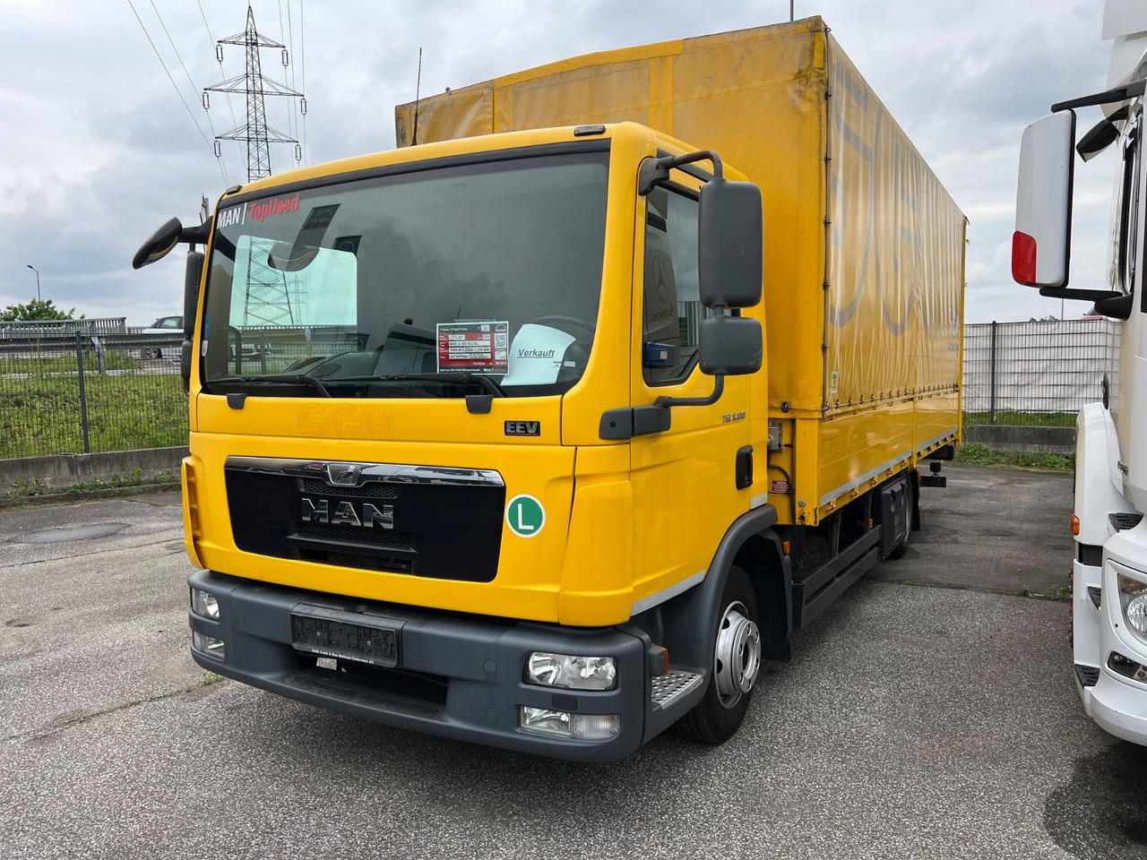 MAN TGL 8 180 - Schuifzeilen vrachtwagen: afbeelding 1 MAN TGL 8 180 - Schuifzeilen vrachtwagen: afbeelding 1