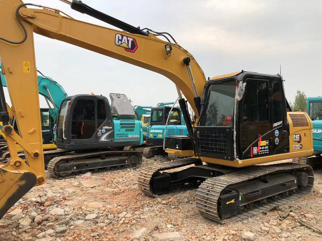 CATERPILLAR 312D12G Wheel Excavator Click for Discount - Rupsgraafmachine: afbeelding 1 CATERPILLAR 312D12G Wheel Excavator Click for Discount - Rupsgraafmachine: afbeelding 1