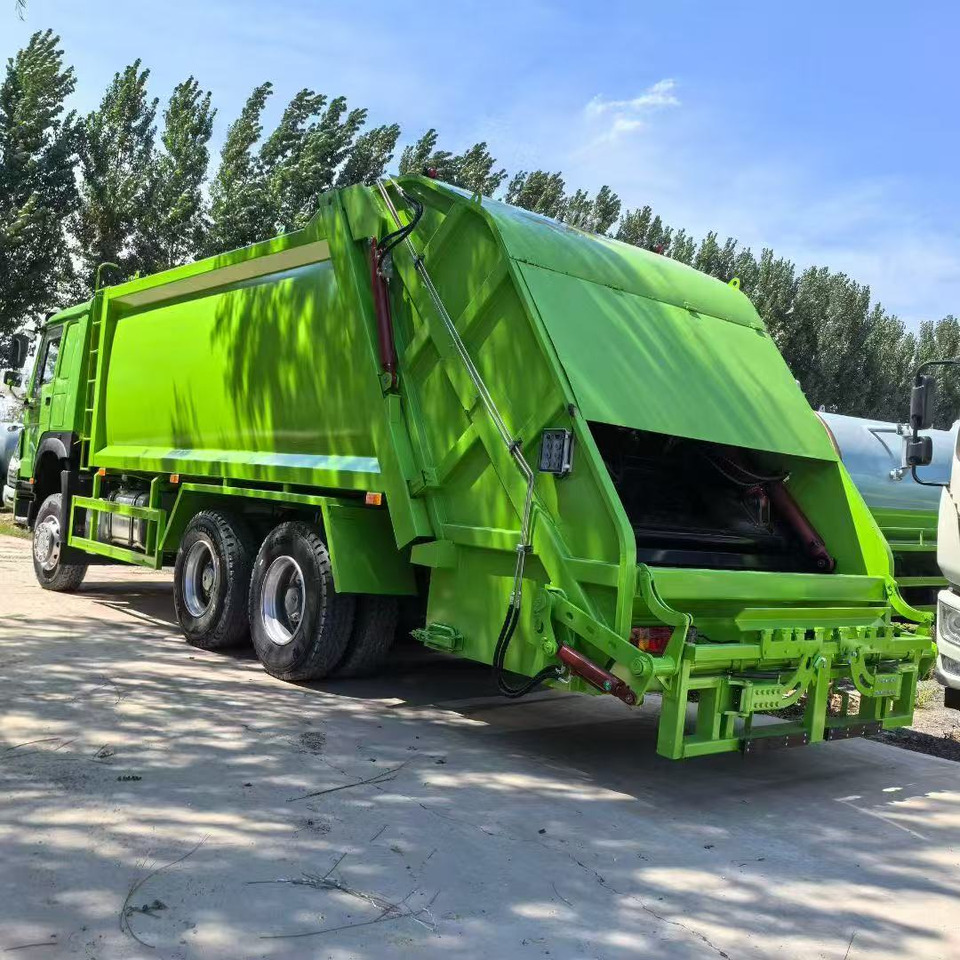 HOWO Garbage Truck Click Here for Discount - Vuilniswagen: afbeelding 4 HOWO Garbage Truck Click Here for Discount - Vuilniswagen: afbeelding 4