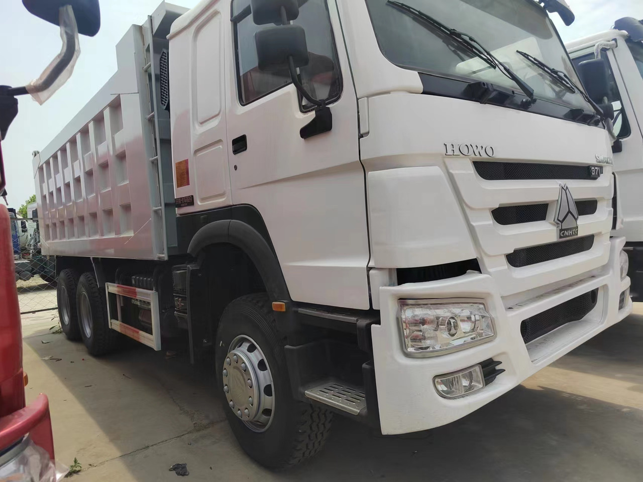 Sino HOWO 6x4 Dump Truck Click for Discount - Kipper vrachtwagen: afbeelding 5 Sino HOWO 6x4 Dump Truck Click for Discount - Kipper vrachtwagen: afbeelding 5