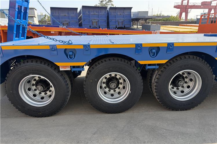 TITAN 3 Axle 80 Ton Low Bed Trailer Price for Sale In Nigeria - Dieplader oplegger: afbeelding 2 TITAN 3 Axle 80 Ton Low Bed Trailer Price for Sale In Nigeria - Dieplader oplegger: afbeelding 2