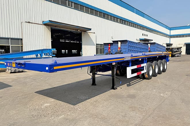 TITAN Heavy Duty 4 Axle Flatbed Trailer in Guam - Open bak met boorden oplegger: afbeelding 1 TITAN Heavy Duty 4 Axle Flatbed Trailer in Guam - Open bak met boorden oplegger: afbeelding 1