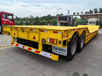 TITAN Rgn Lowboy Trailer for Sale in Zambia - Dieplader oplegger: afbeelding 1 TITAN Rgn Lowboy Trailer for Sale in Zambia - Dieplader oplegger: afbeelding 1