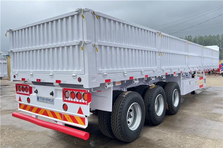TITAN Tri Axle Dropside Trailer For Sale In Nigeria Lagos - Open bak met boorden oplegger: afbeelding 2 TITAN Tri Axle Dropside Trailer For Sale In Nigeria Lagos - Open bak met boorden oplegger: afbeelding 2
