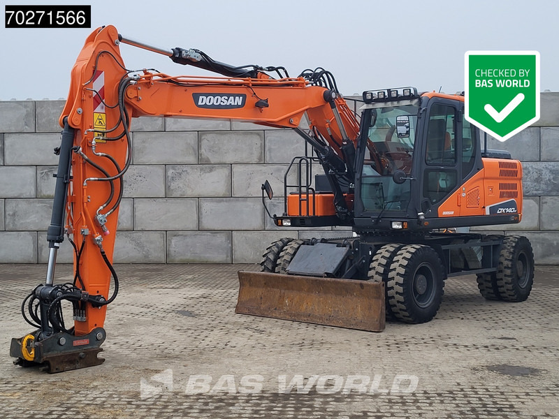 Doosan DX140 W-5 OIL QUICK - GERMAN - Mobiele graafmachine: afbeelding 1 Doosan DX140 W-5 OIL QUICK - GERMAN - Mobiele graafmachine: afbeelding 1