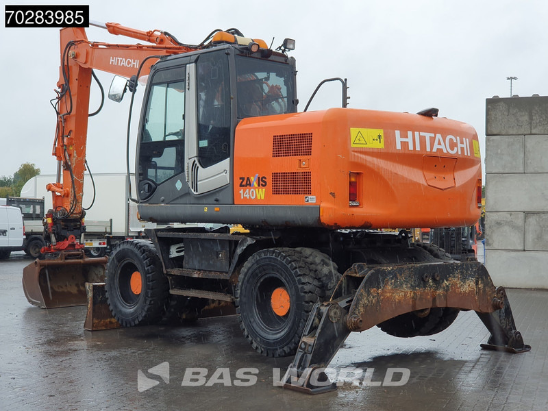 Hitachi ZX140W -3 OUTRIGGERS - ROTOTILT - Mobiele graafmachine: afbeelding 2 Hitachi ZX140W -3 OUTRIGGERS - ROTOTILT - Mobiele graafmachine: afbeelding 2