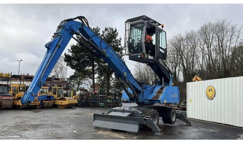Fuchs MHL320 - Overslagkraan: afbeelding 1 Fuchs MHL320 - Overslagkraan: afbeelding 1