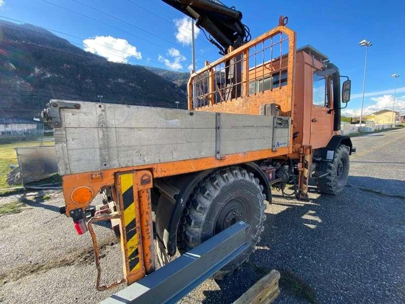Mercedes UNIMOG U 140 MACHINE SUISSE - Kipper vrachtwagen: afbeelding 2 Mercedes UNIMOG U 140 MACHINE SUISSE - Kipper vrachtwagen: afbeelding 2
