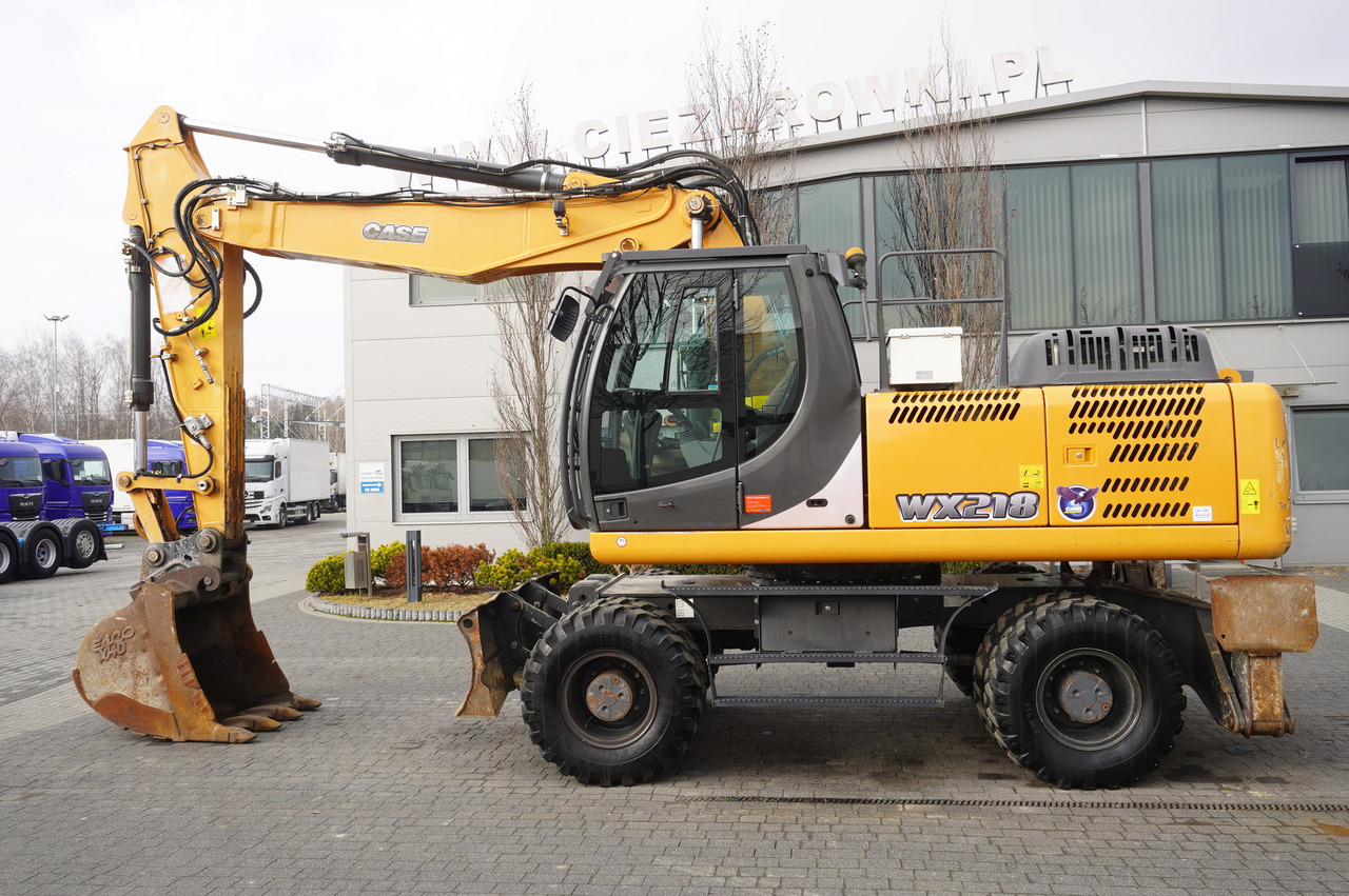 CASE WX218 / 23t wheeled excavator / 3 times folding arm - Mobiele graafmachine: afbeelding 1 CASE WX218 / 23t wheeled excavator / 3 times folding arm - Mobiele graafmachine: afbeelding 1