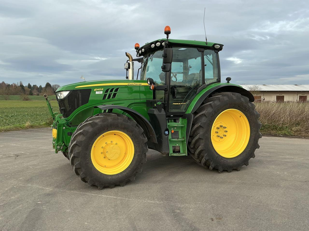 John Deere 6145 R Premium - Tractor: afbeelding 1 John Deere 6145 R Premium - Tractor: afbeelding 1