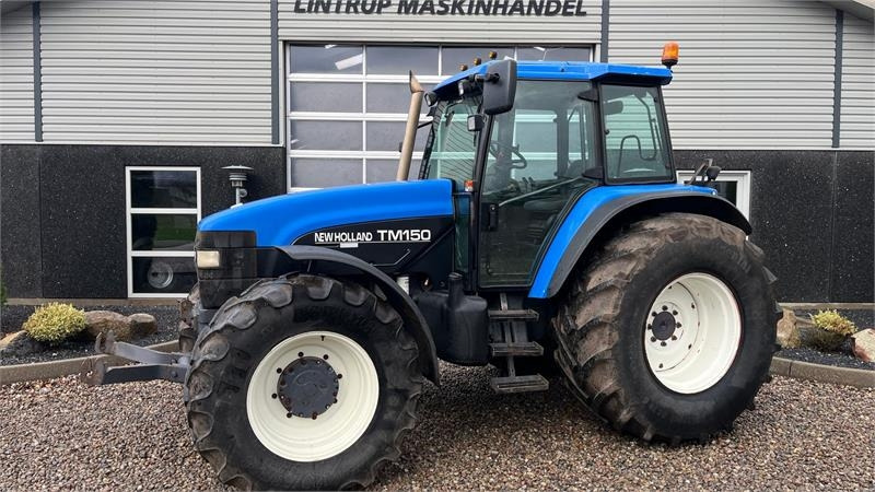 New Holland TM150 Med frontlift - Tractor: afbeelding 1 New Holland TM150 Med frontlift - Tractor: afbeelding 1